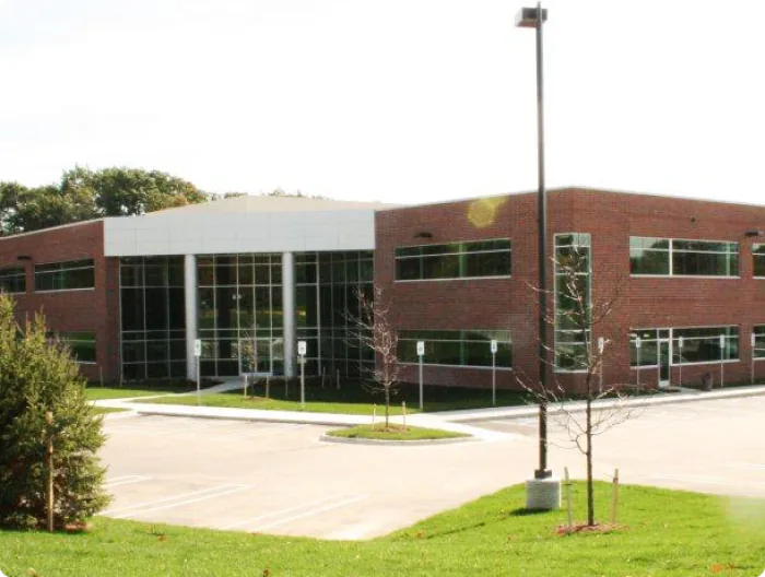 Commercial building with brick walls and a glass entrance