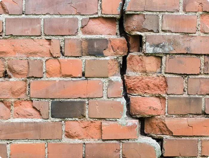Cracked brick wall
